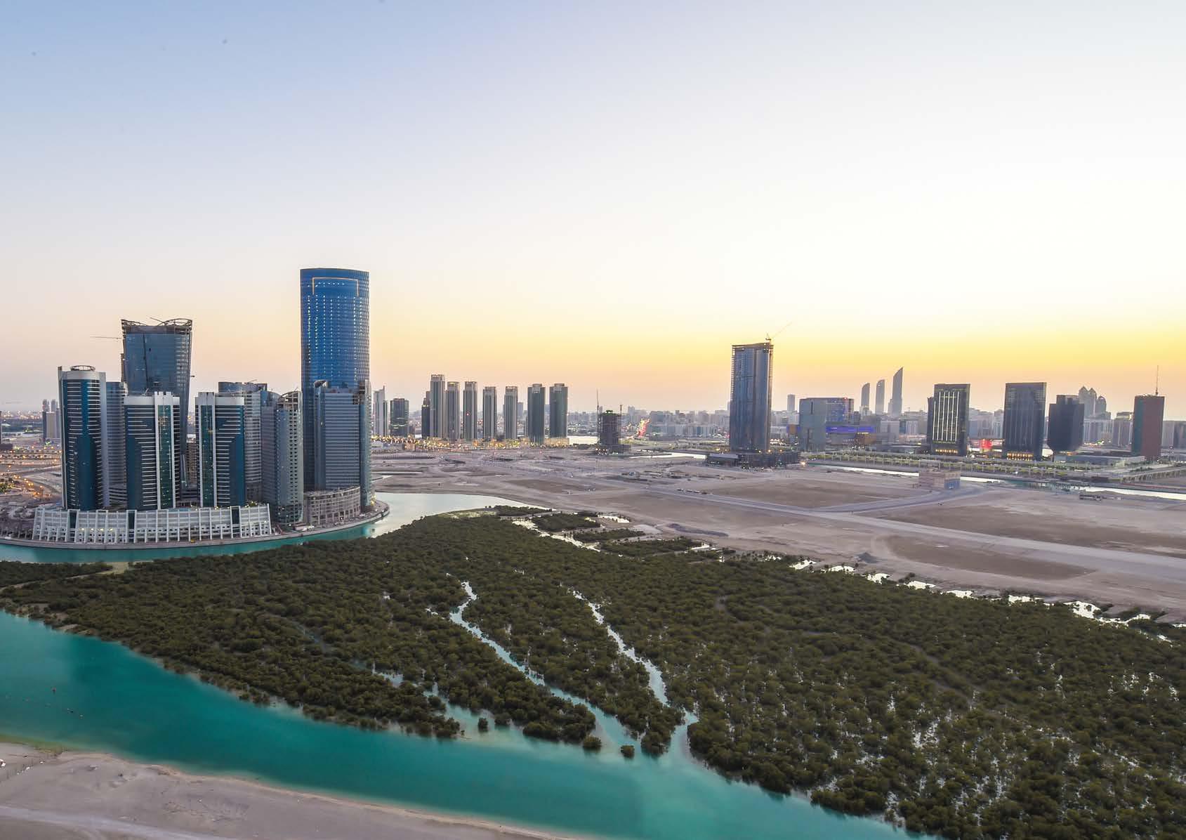 Al Durrah Tower Al Reem Island full building shot showcasing architecture and surrounding community landscapes.